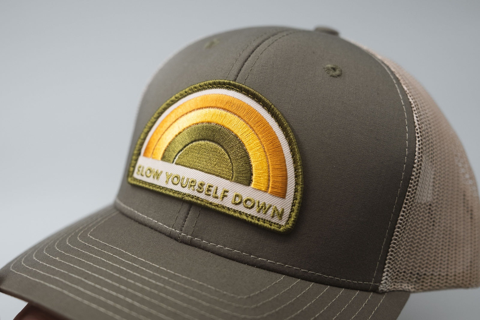 Recycled Rainbow Trucker Hat Hats - Slow Yourself Down